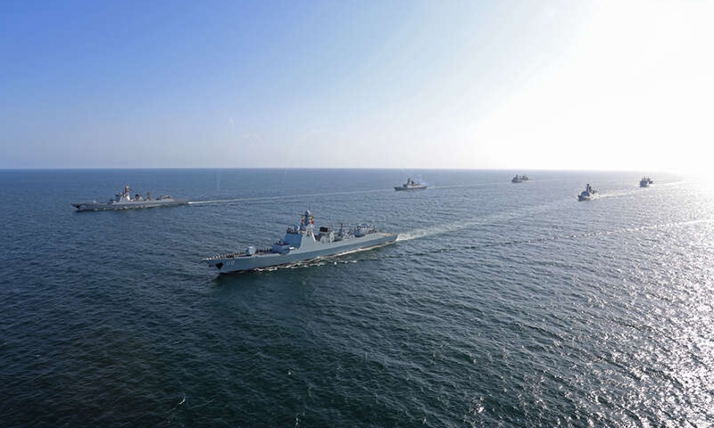 PLA Navy steps into deep blue, contributes to global peace and stability with 15 years of overseas escort missions(图1)