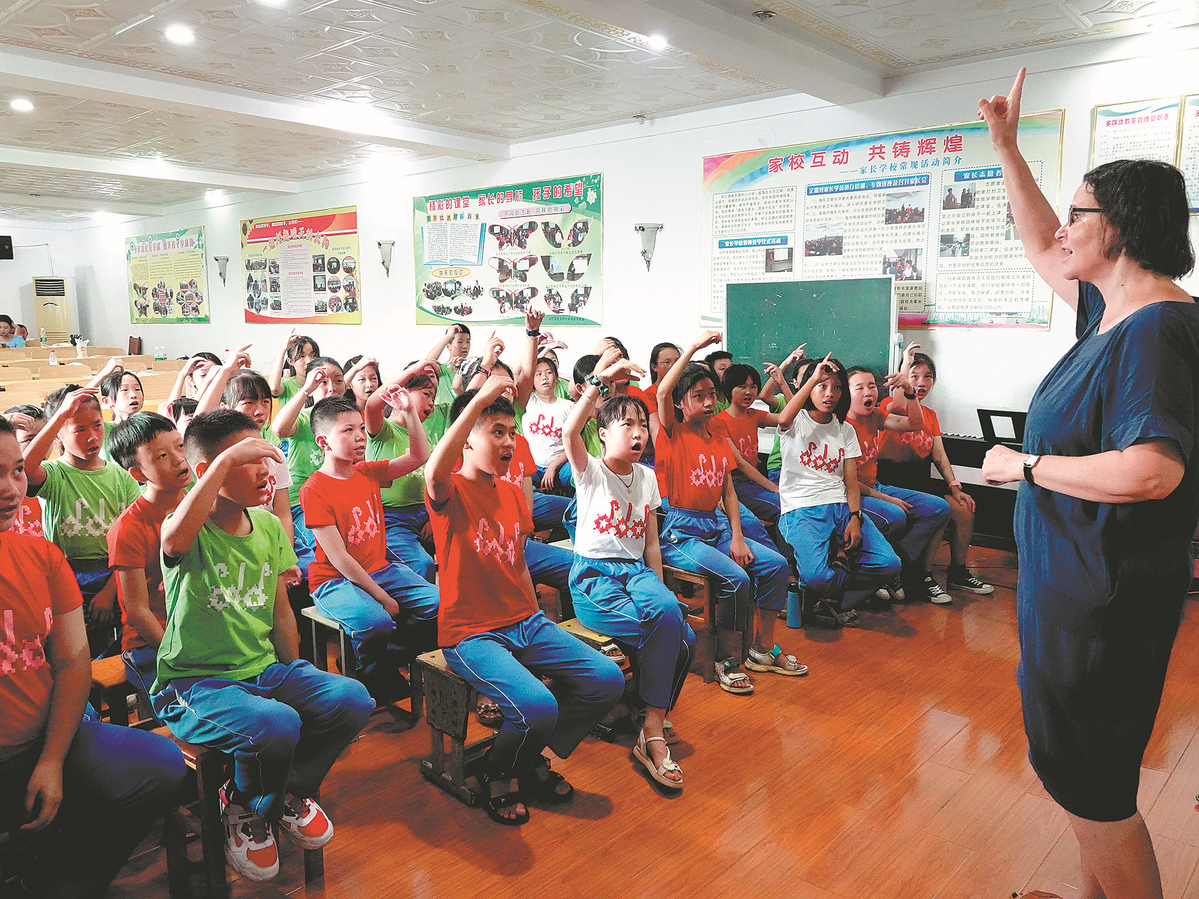 Choral singing method transforms lives in Hunan(图1)